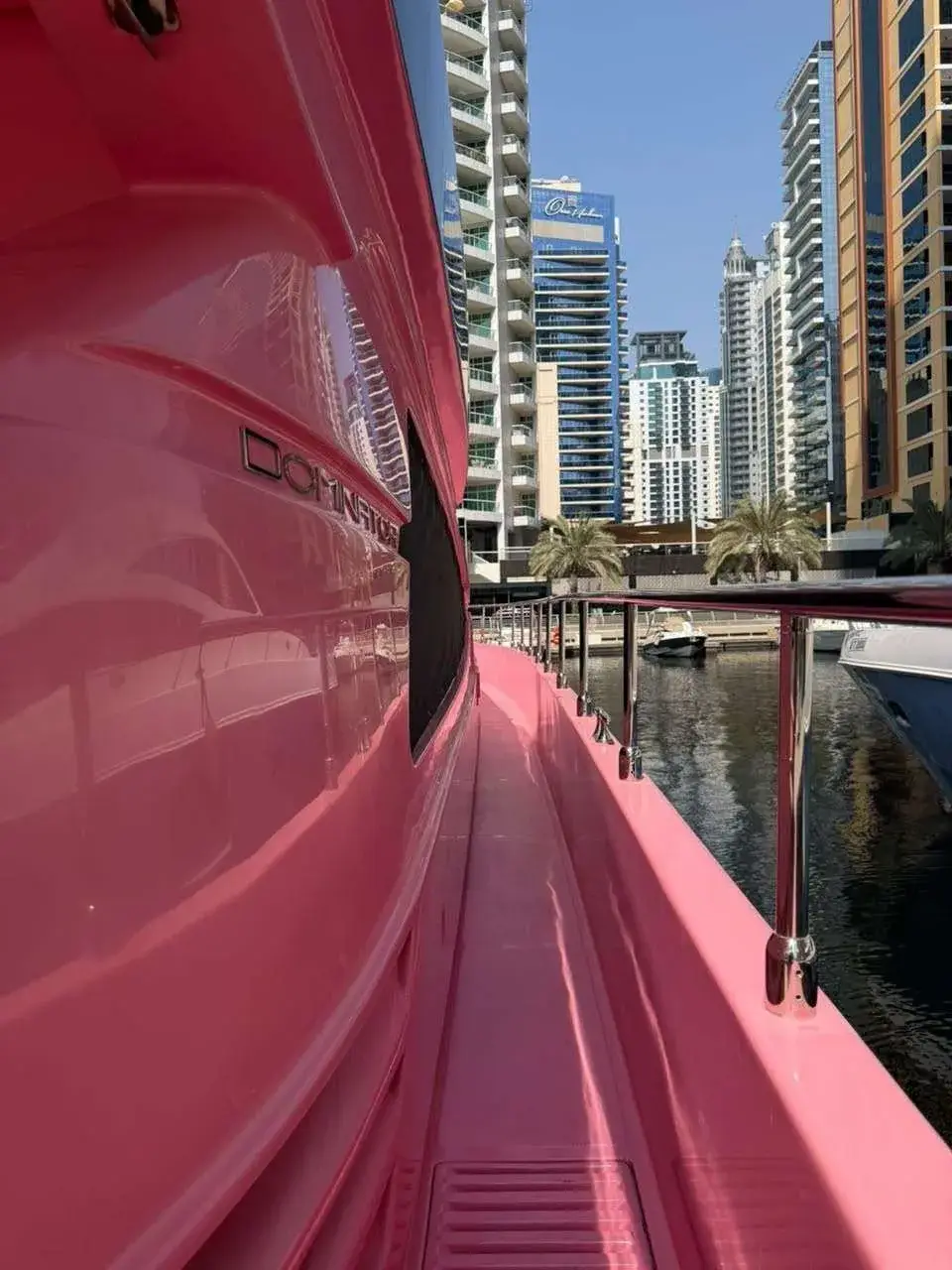 Pink side deck walkway of the Pink Yacht in Dubai Marina